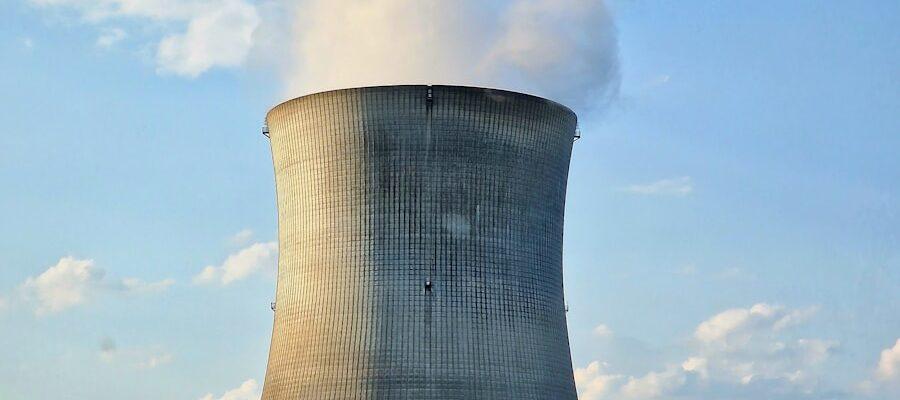 a nuclear power plant emitting smoke into the sky