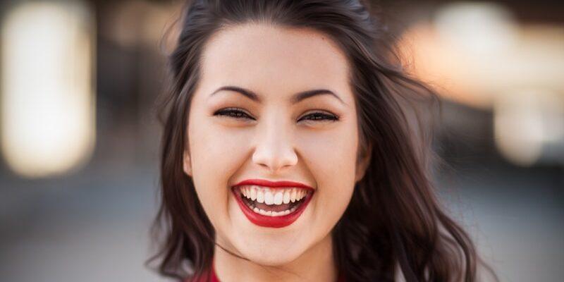 closeup photography of woman smiling